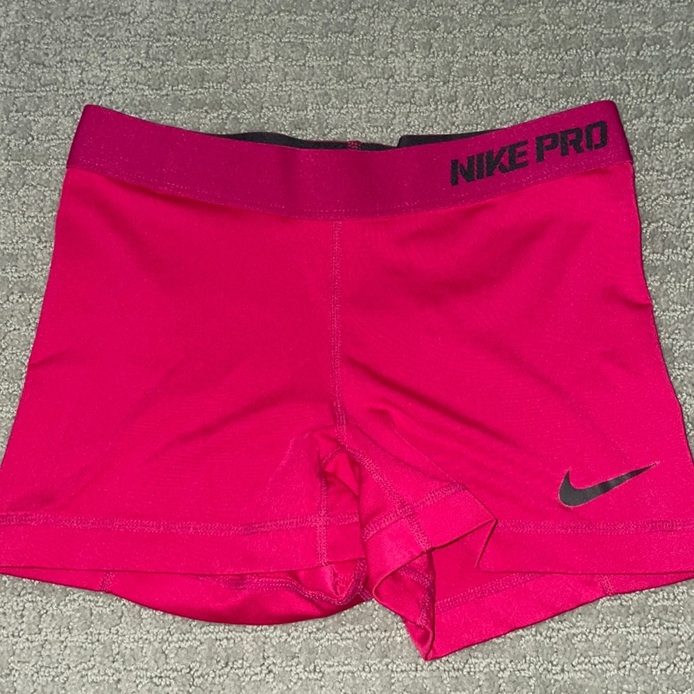 Pink Nike pros